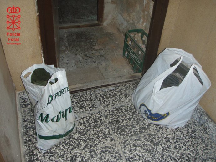 Bolsas con objetos sustraídos en la vivienda de Arguedas