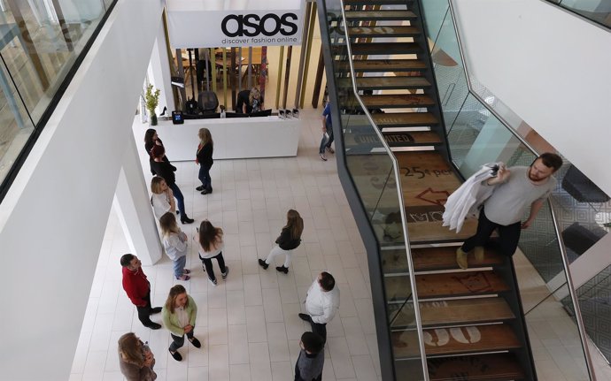 New employees wait in the lobby on their first day of work at the ASOS headquart
