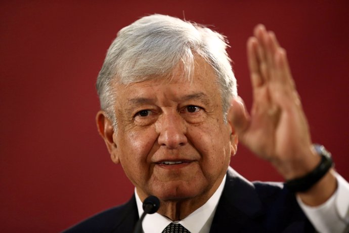 FILE PHOTO: Mexico's new President Andres Manuel Lopez Obrador speaks as he hold