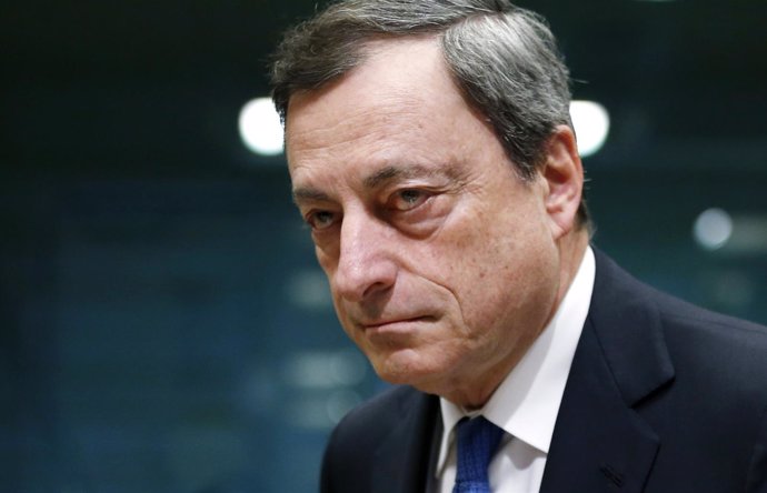 European Central Bank (ECB) President Mario Draghi looks on at the start of a eu