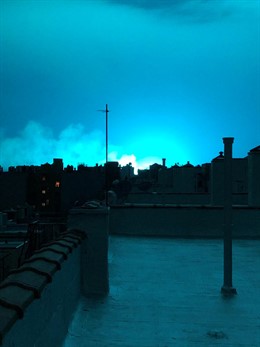 Bright blue light is seen after a transformer explosion on Thursday at an electr