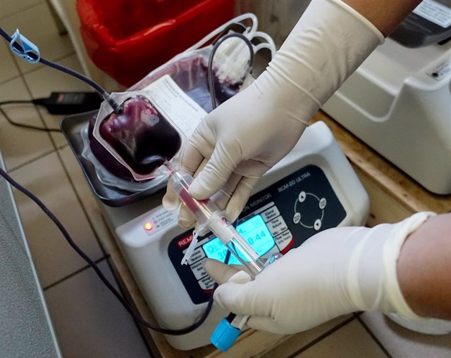 A nurse handles a unit blood at a donation center in a hospital in La Paz, Boliv