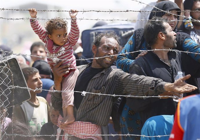 Refugiados sirios intentan cruzar a Turquía