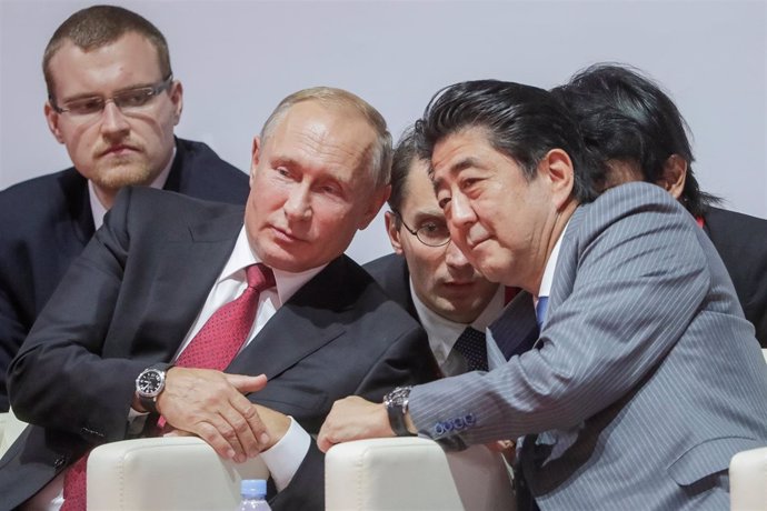 Vladimir Putin y Shinzo Abe