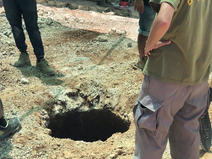 Trabajos de exhumación en la fosa  de Alaró