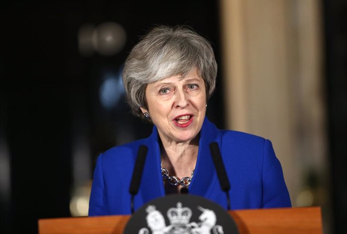 May wins no-confidence vote after defeat on Brexit deal