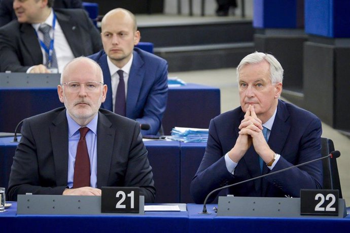 Michel Barnier y Frans Timmermans