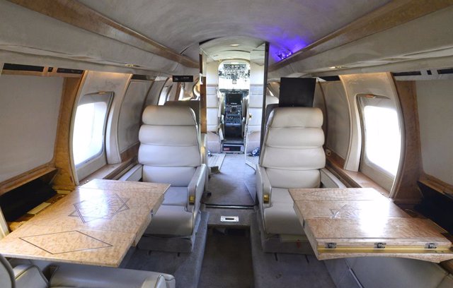 The inside of a luxury Jetstar private jet, built in the seventies and retaining