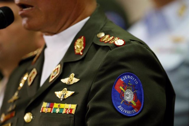A detail of the Venezuelan army badge is seen on the uniform of Venezuela's Defe