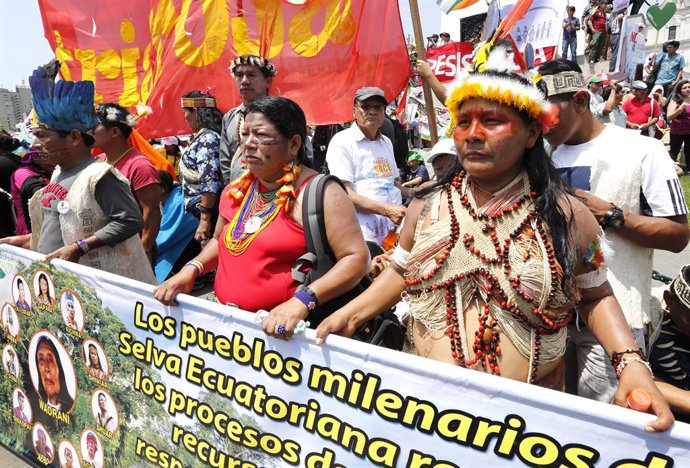 Ecuadorean indigenous environmental activists march at the "People's Climate Mar