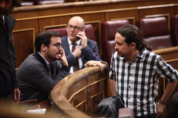 Alberto Garzón y Pablo Iglesias en el Pleno del Congreso