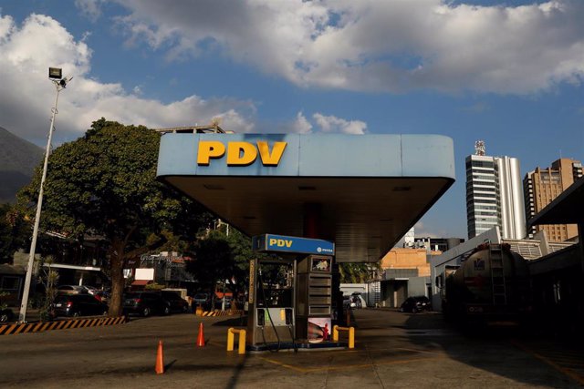 The corporate logo of the Venezuelan oil company PDVSA is seen at a gas station