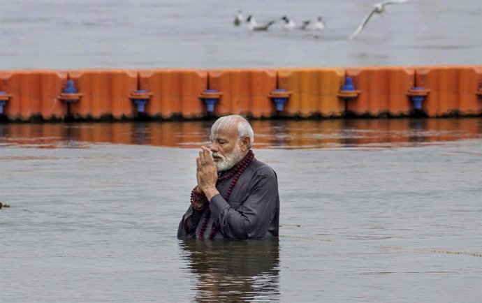 Modi takes holy bath at Kumbh Mela in India