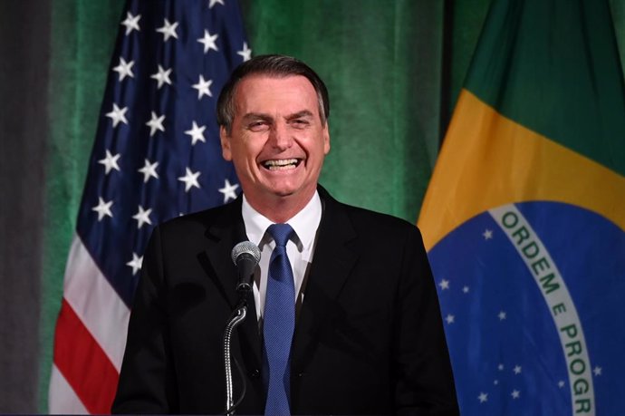 Brasil/EEUU.- Bolsonaro ratifica su apoyo al muro de Trump: "La mayoría de los i