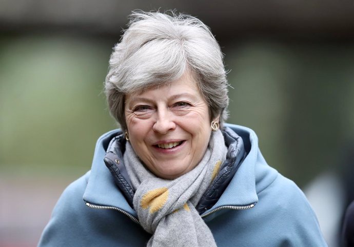 Theresa May attends church service in England