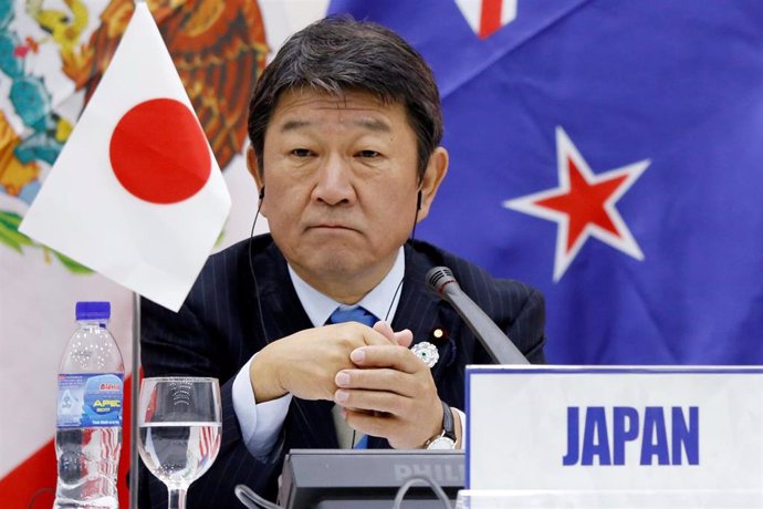 Japanese Minister of Economic Revitalization Toshimitsu Motegi attends a news co