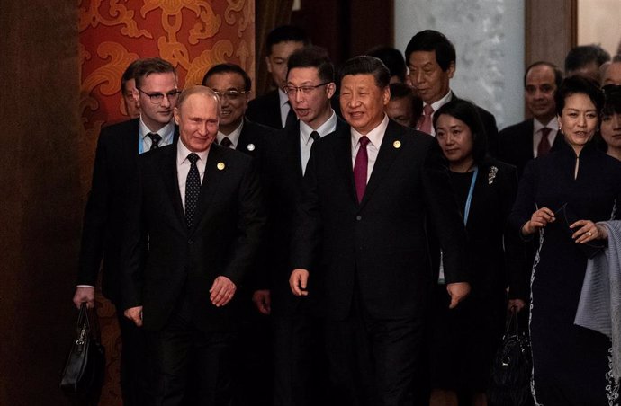 Rusia/China.- Putin y Xi critican la injerencia occidental que incrementa la tensión Siria, Venezuela y Libia