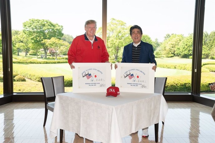 Abe takes Trump golfing
