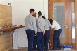 Alumnos en un taller de empleo
