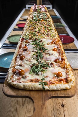 Economía.- Kilómetros de Pizza dobla su tamaño e impulsa su expansión con su desembarco al resto de España