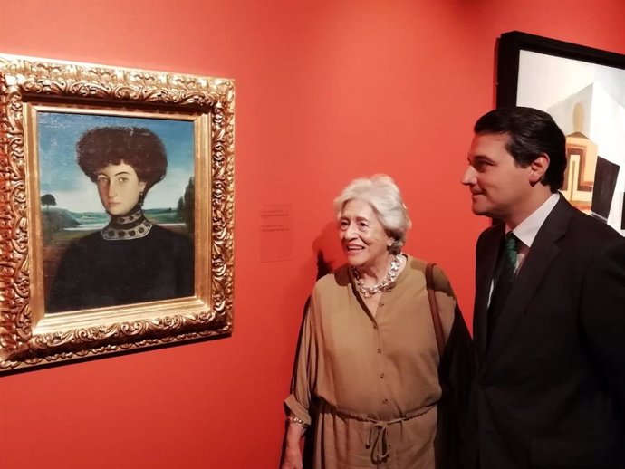 Teresa Jiménez y José María Bellido ante el cuadro de Julio Romero de Torres de 'La condesa de Casa Rojas'