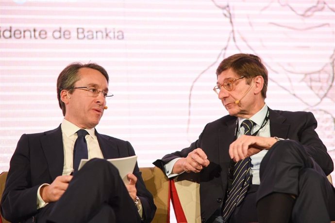 Hector Florez, socio director de consultoria de Deloitte y Jose Ignacio Goirigolzarri, presidente de Bankia