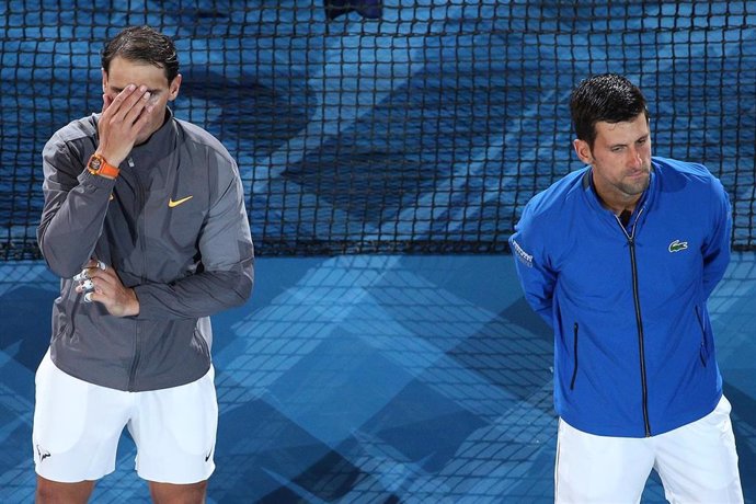 Novak Djokovic junto a Rafa Nadal tras la final del Abierto de Australia 2019