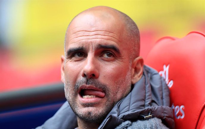 18 May 2019, England, London: Manchester City manager Pep Guardiola is pictured prior to the English FA Cup Final soccer match between Manchester City and Watford at Wembley Stadium. Photo: Mike Egerton/PA Wire/dpa