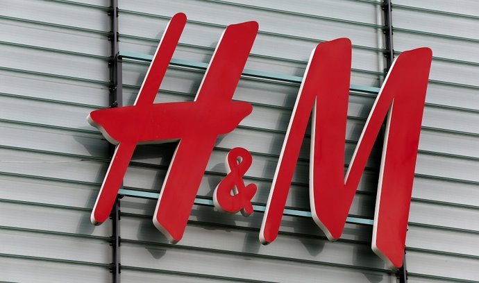 Logo of Swedish fashion retail group H&M is seen at a building in Dietlikon