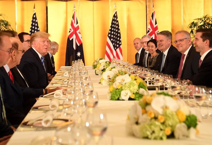 27 June 2019, Japan, Osaka: Australian Prime Minister Scott Morrison (2-R) meets with US President Donald Trump (4-L), ahead of the official start of the G20 summit, which to take place on 28 and 29 June 2019. Photo: Lukas Coch/AAP/dpa