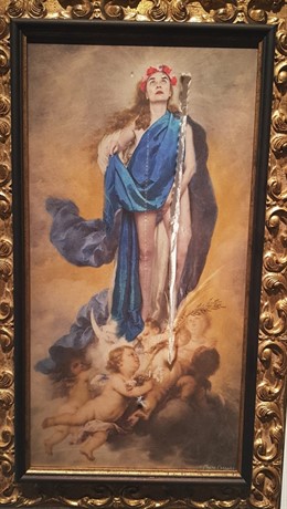 Aspecto del lienzo 'Con flores a María' que ha sufrido el atentado y que es objeto de polémica