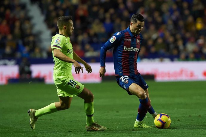Jason Remeseiro of Levante UD and Jordi Alba of FC Barcelona during the La Liga match between Levante UD and FC Barcelona at Ciutat de Valencia Stadium on December 16, 2018 in Valencia, Spain.