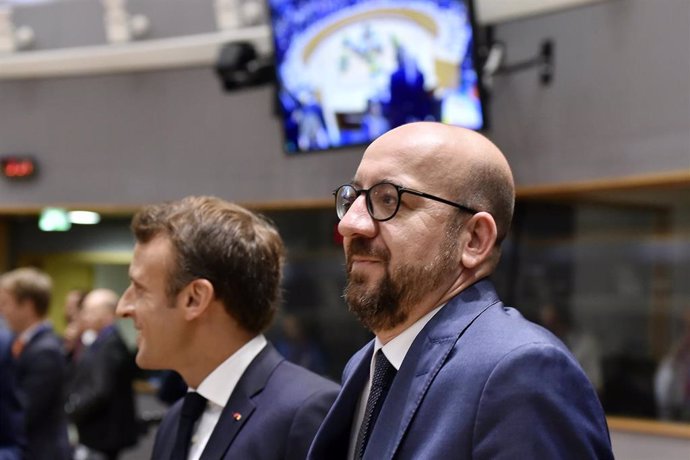 21 June 2019, Belgium, Brussels: President of France Emmanuel Macron (L) and Belgian Prime Minister Charles Michel attend the second day of the EU summit. Photo: Pool Eric Vidal/BELGA/dpa