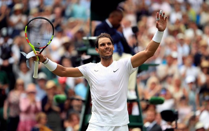 08 July 2019, England, London: Spanish tennis player Rafael Nadal celebrates victory after defeating Portugal's Joao Sousa during their men's singles round of 16 match on day seven of the 2019 Wimbledon Grand Slam tennis tournament at the All England La