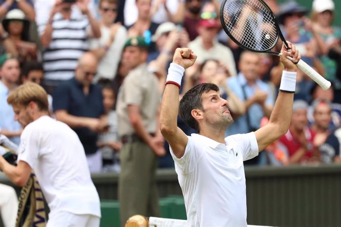 10 July 2019, England, London: Serbian tennis player Novak Djokovic celebrates victory after defeating Belgium's David Goffin in their men's singles quarter-final match on day nine of the 2019 Wimbledon Grand Slam tennis tournament at the All England La