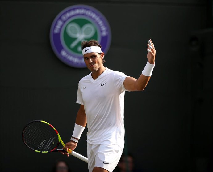 10 July 2019, England, London: Spanish tennis player Rafael Nadal reacts during his men's singles quarter-final match against US Sam Querrey on day nine of the 2019 Wimbledon Grand Slam tennis tournament at the All England Lawn Tennis and Croquet Club. 