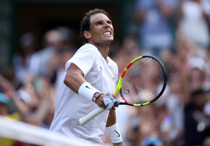 10 July 2019, England, London: Spanish tennis player Rafael Nadal celebrates defeating US Sam Querrey during their men's singles quarter-final match on day nine of the 2019 Wimbledon Grand Slam tennis tournament at the All England Lawn Tennis and Croque
