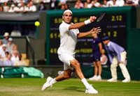 Federer: "Nadal ha mejorado mucho en hierba"