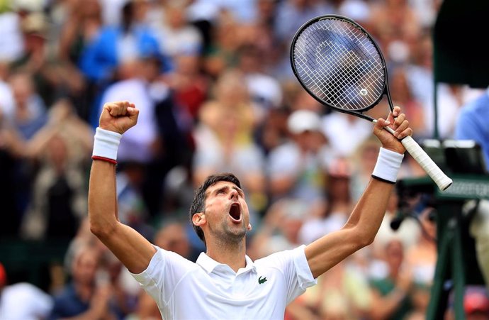 10 July 2019, England, London: Serbian tennis player Novak Djokovic celebrates victory after defeating Belgium's David Goffin in their men's singles quarter-final match on day nine of the 2019 Wimbledon Grand Slam tennis tournament at the All England La