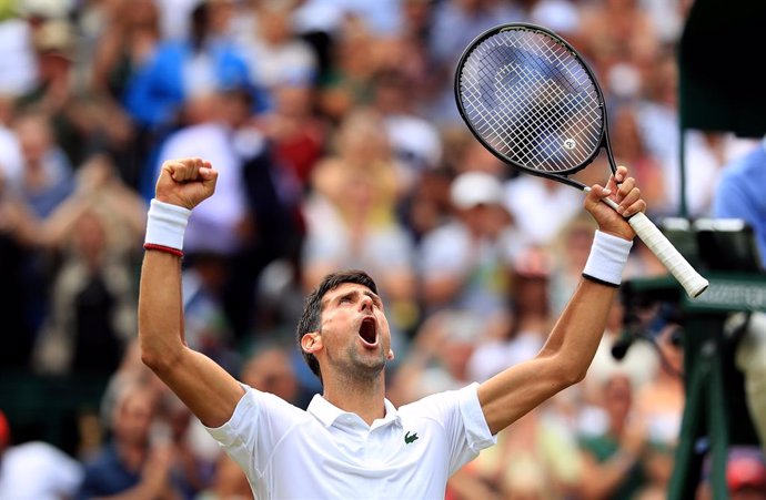 10 July 2019, England, London: Serbian tennis player Novak Djokovic celebrates victory after defeating Belgium's David Goffin in their men's singles quarter-final match on day nine of the 2019 Wimbledon Gran eslam tennis tournament at the All England La