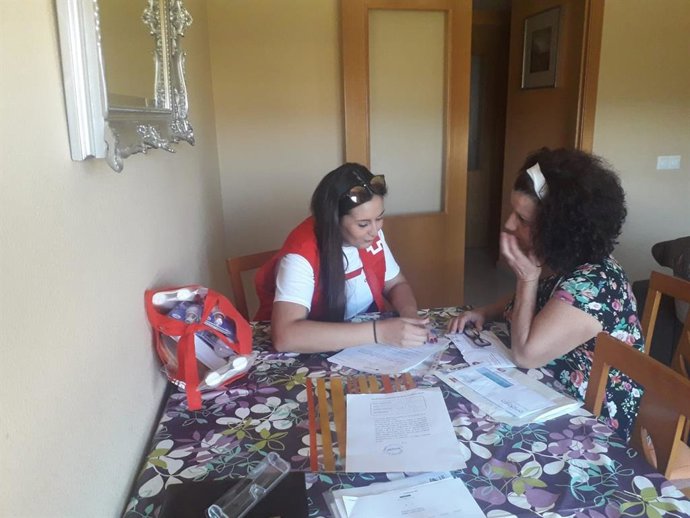 Visita de uno de los voluntarios a una de las familias en Málaga.