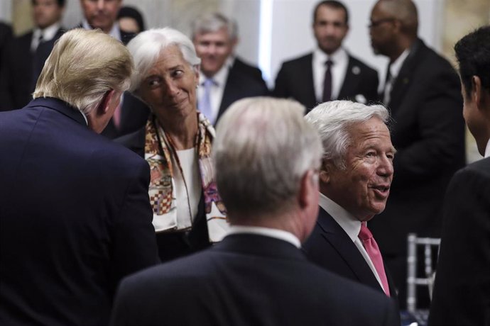 July 8, 2019 - Washington, DC, United States: President Donald Trump, left, talks to International Monetary Fund Managing Director Christine Lagarde, second left, next to the owner of the New England Patriots Robert Kraft, second from the right, and Qat