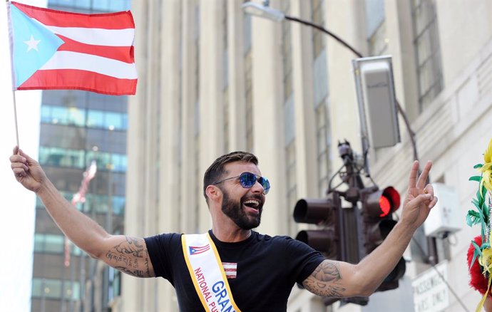 June 9, 2019, New York, New York, USA. Ricky Martin dances on his float as he continues up Fifth Avenue during the Puerto Rican Day Parade. He is the Grand Marshall at the Puerto Rican Day Parade (Andrea Renault / Contacto Images)