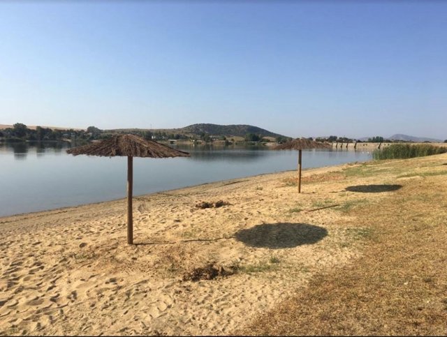 Sombrillas en Proserpina