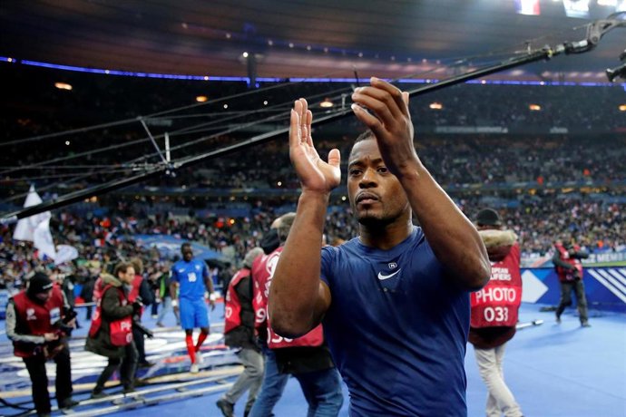 El jugador francés Patrice Evra en un partido en el Estadio de Francia en Saint-Denis