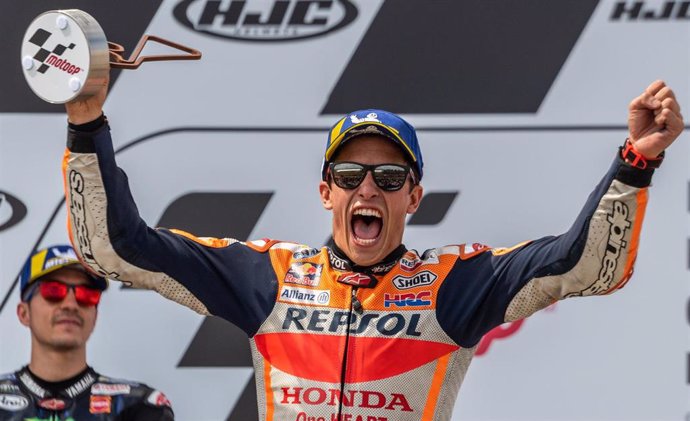 07 July 2019, Hohenstein-Ernstthal: Spanish MotoGP rider Marc Marquez of Repsol Honda Team celebrates winning on the podium after the MotoGP race of the motorcycling Grand Prix of Germany at the Sachsenring racing circuit. Photo: Robert Michael/dpa-Zent