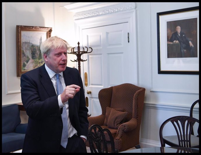 24/07/2019. London, United Kingdom: Boris Johnson becomes Britain's new Prime Minister. Boris Johnson looks at the white board in his office, that contains the names of his new cabinet as arrive's in Number 10 Downing Street as Britain's new Prime Minis