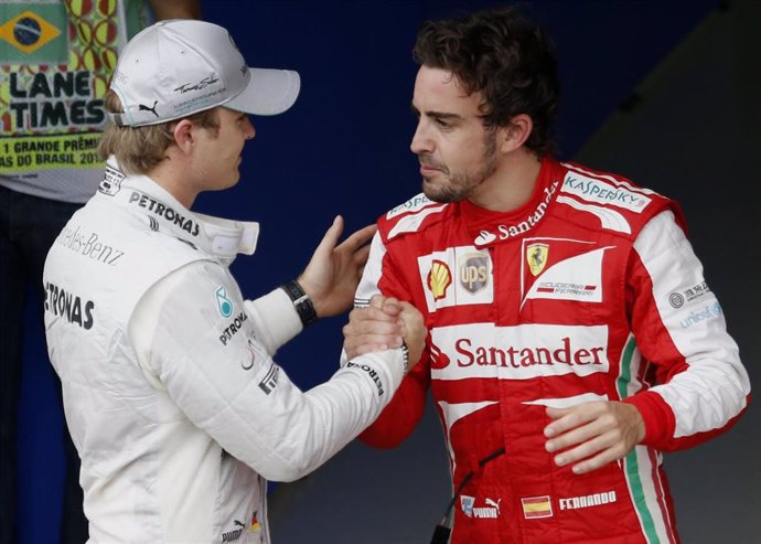 Nico Rosberg y Fernando Alonso en el Gran Premio de Brasil 2013