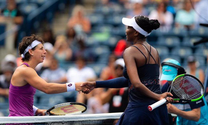 Carla Suarez Navarro of Spain & Venus Williams of the United States in action during the first round at the 2019 Rogers Cup WTA Premier Tennis 5 Tournament
