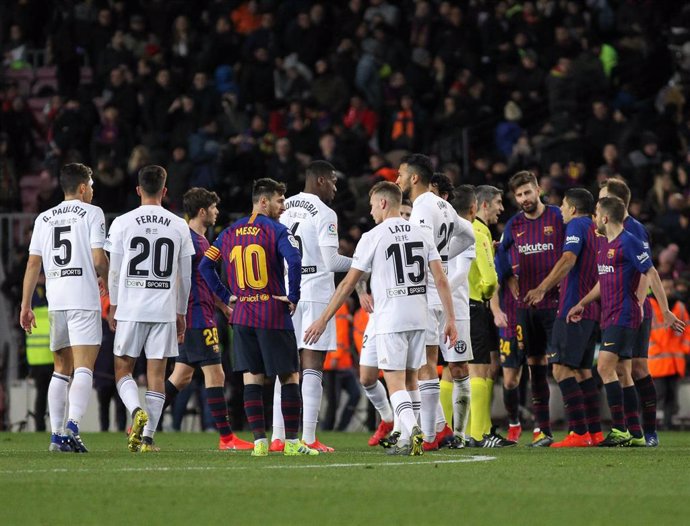 Players of Barcelona and Valencia in action during La Liga Spanish championship, , football match between Barcelona and Valencia, February 02th, in Camp Nou Stadium in Barcelona, Spain.